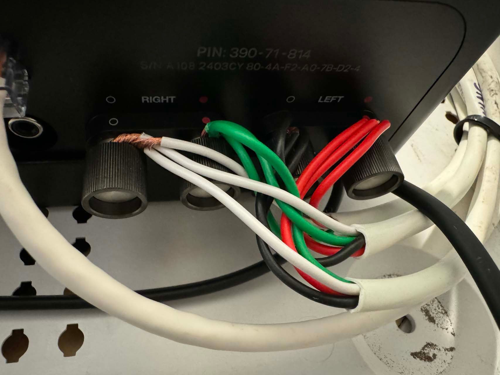 A bunch of wires are connected to a device that says right and left