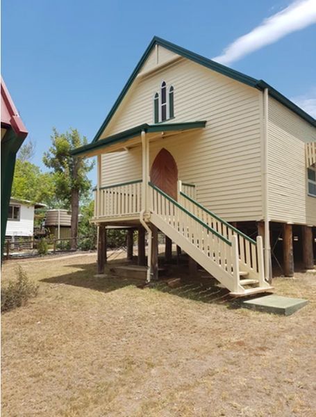 A White House with Stairs Leading up To It — A Brush With Colour in Urangan, QLD