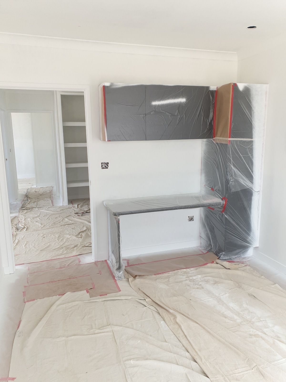 A Person Is Spraying Powder Paint on A Piece of Metal — A Brush With Colour in Pialba, QLD
