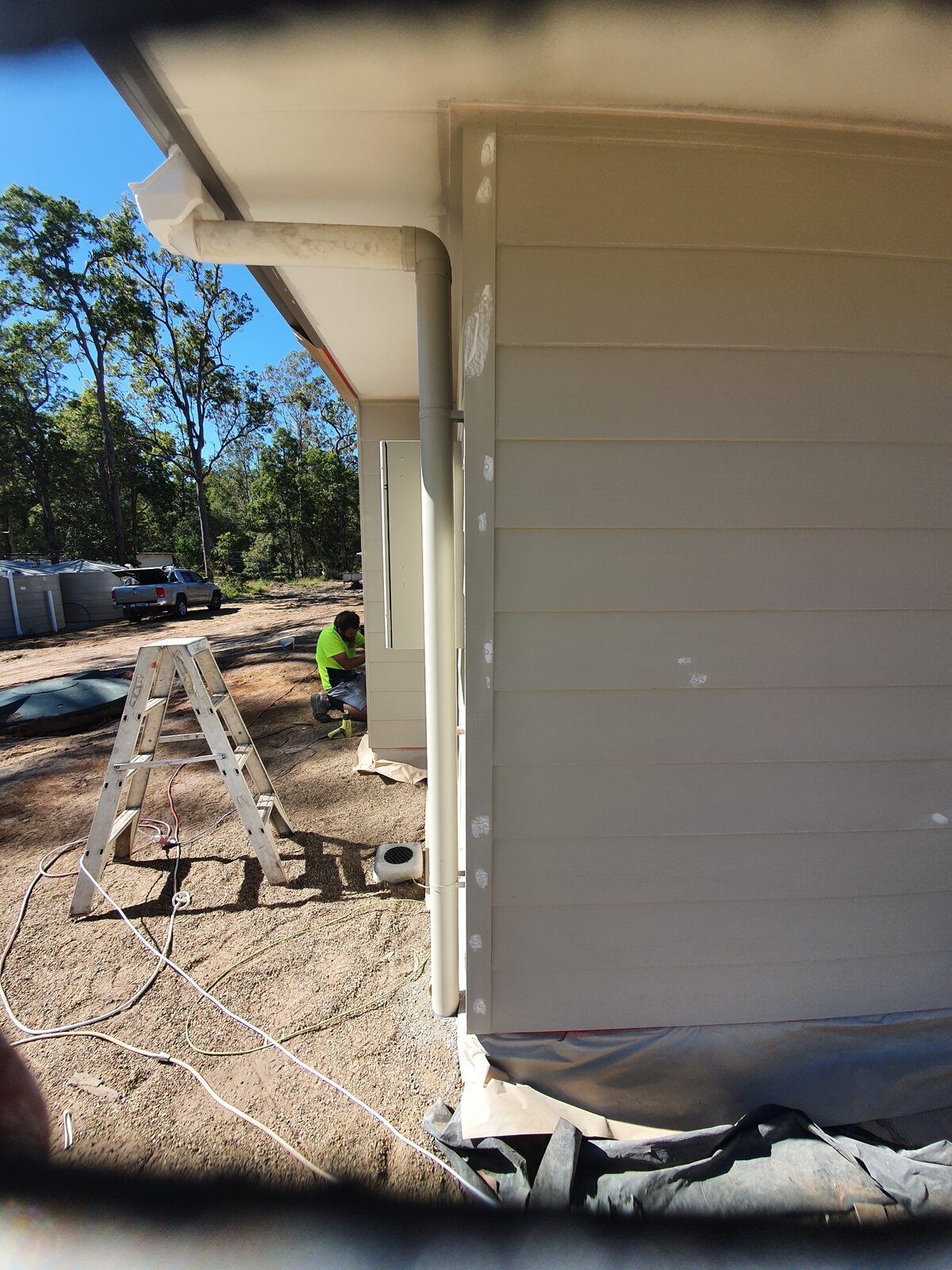 A Person Is Spraying Powder Paint on A Piece of Metal — A Brush With Colour in Torquay, QLD