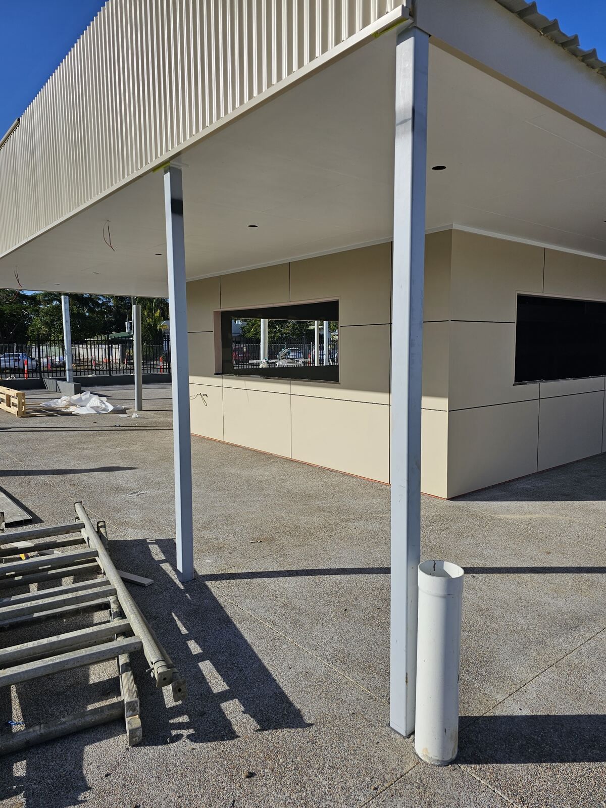 A Person Is Spraying Powder Paint on A Piece of Metal — A Brush With Colour in Urraween, QLD