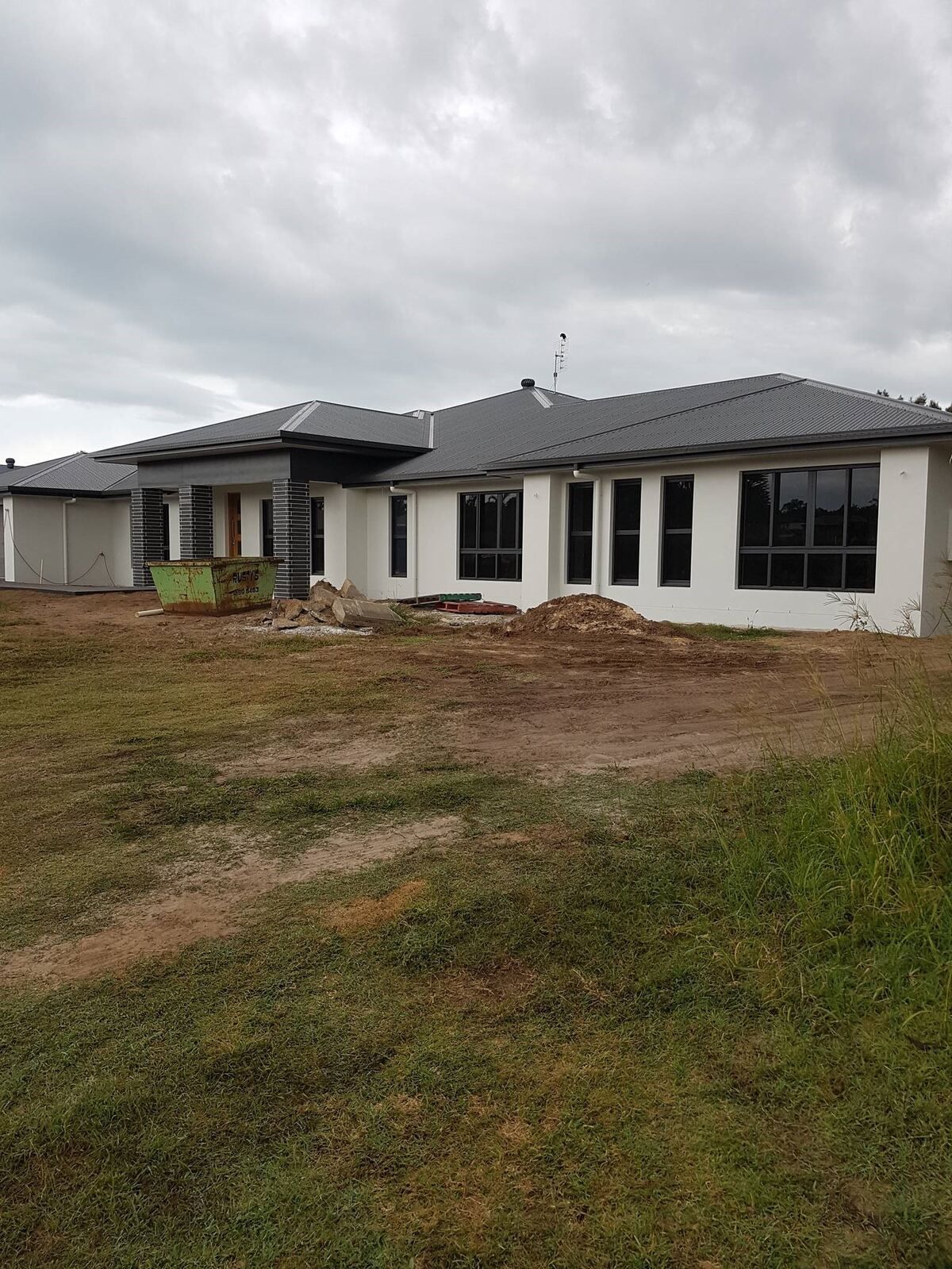 Several Paint Brushes Are Placed On Top Of A Color Palette — A Brush With Colour in Dundowran, QLD