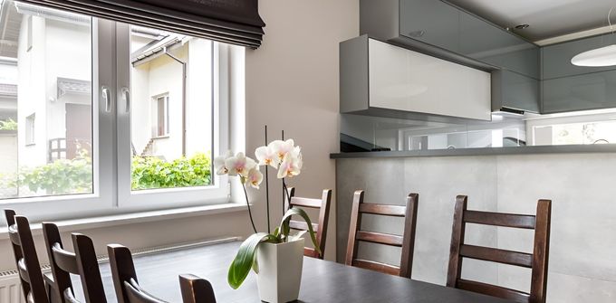 A Dining Room Table With Chairs — Homestead Blinds In Wodonga, VIC