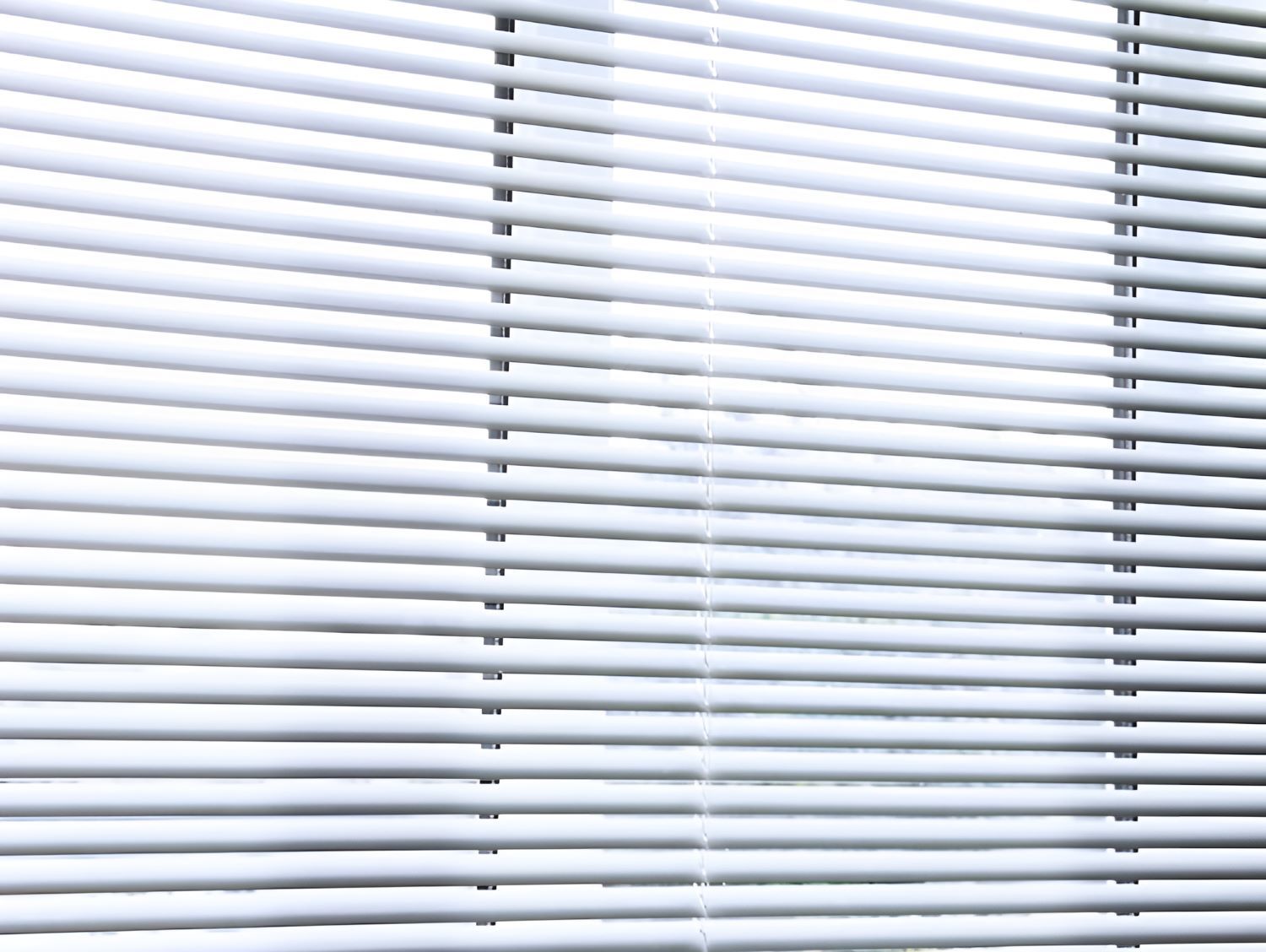 A Close Up of a White Blind on a Window — Homestead Blinds in Wodonga, VIC
