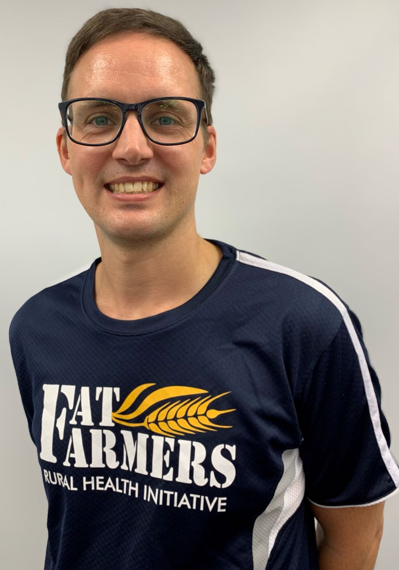 Bradley Barnes, Partner, is wearing the Fat Farmers shirt.