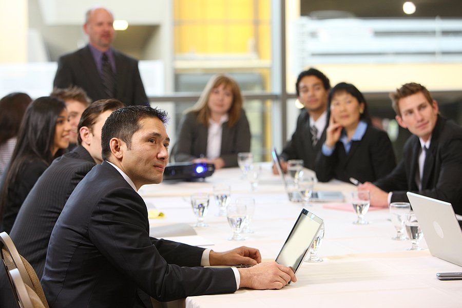 Business people in a boardroom meeting