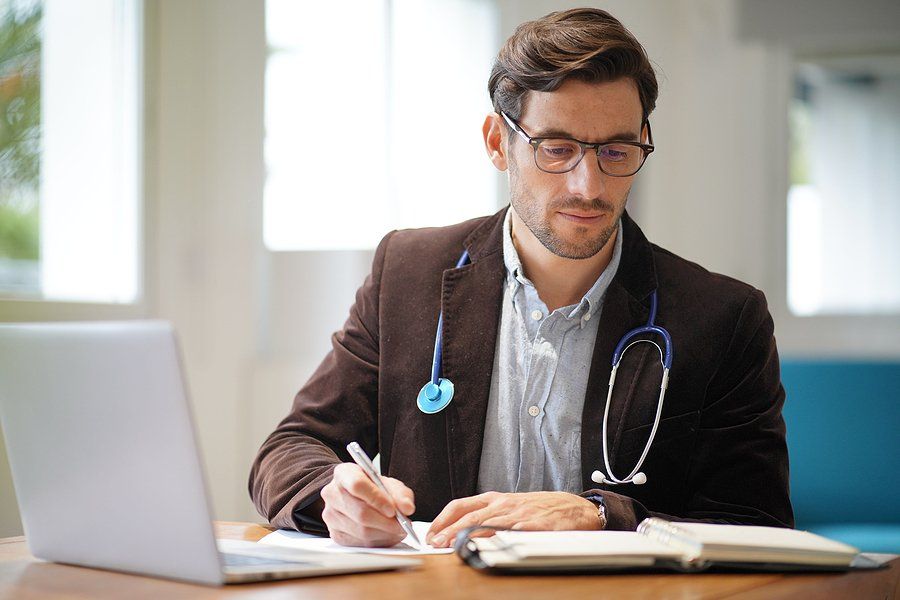 Handsome doctor in an office.