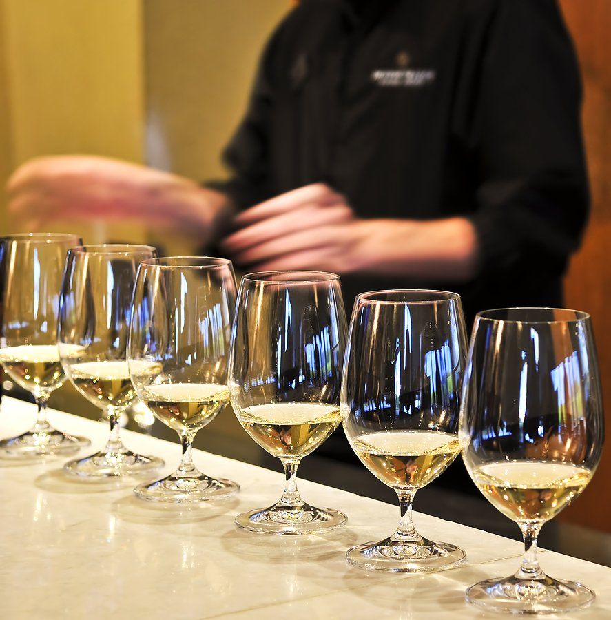 Wine tasting glasses set up for event tasting.