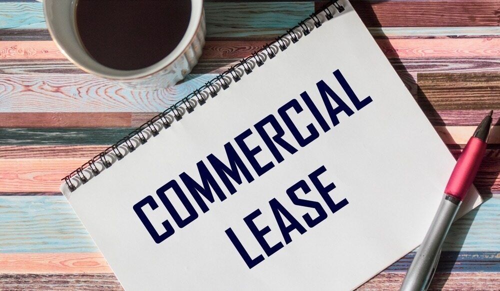 Notebook With Commercial Lease on a Desk — Hannaway Lawyers in Port Macquarie, NSW