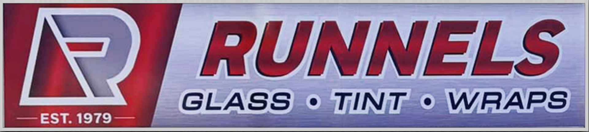 Logo for Runnels offering glass, tint, and wraps, established in 1979. Red and silver color scheme.