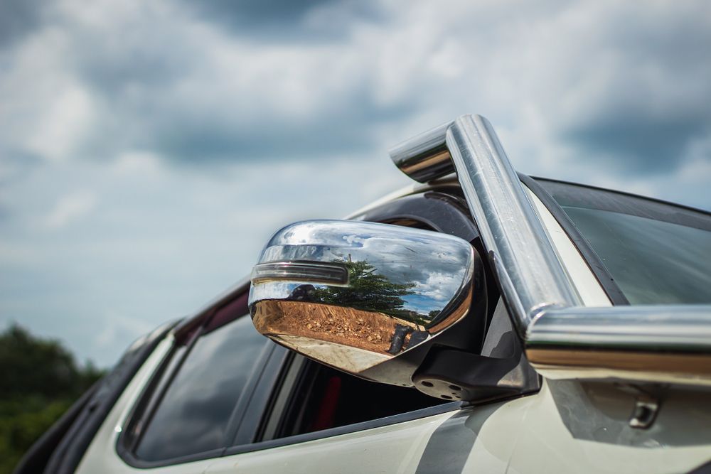Chrome Side Mirror of a White Truck With a Chrome Snorkel — Morty's Mechanical In Garbutt, QLD
