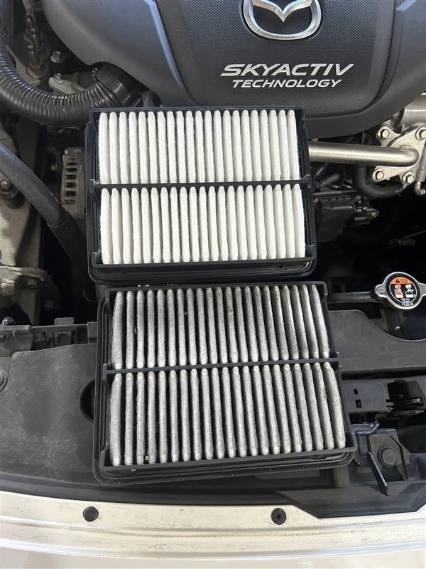 Two Automotive Air Filters, One New and One Dirty — Morty's Mechanical In Garbutt, QLD