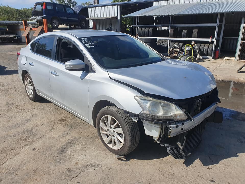 Silver Car at Auto Wreckers — Local Vehicle Scrapping And Repair Professionals in Bondoola, QLD