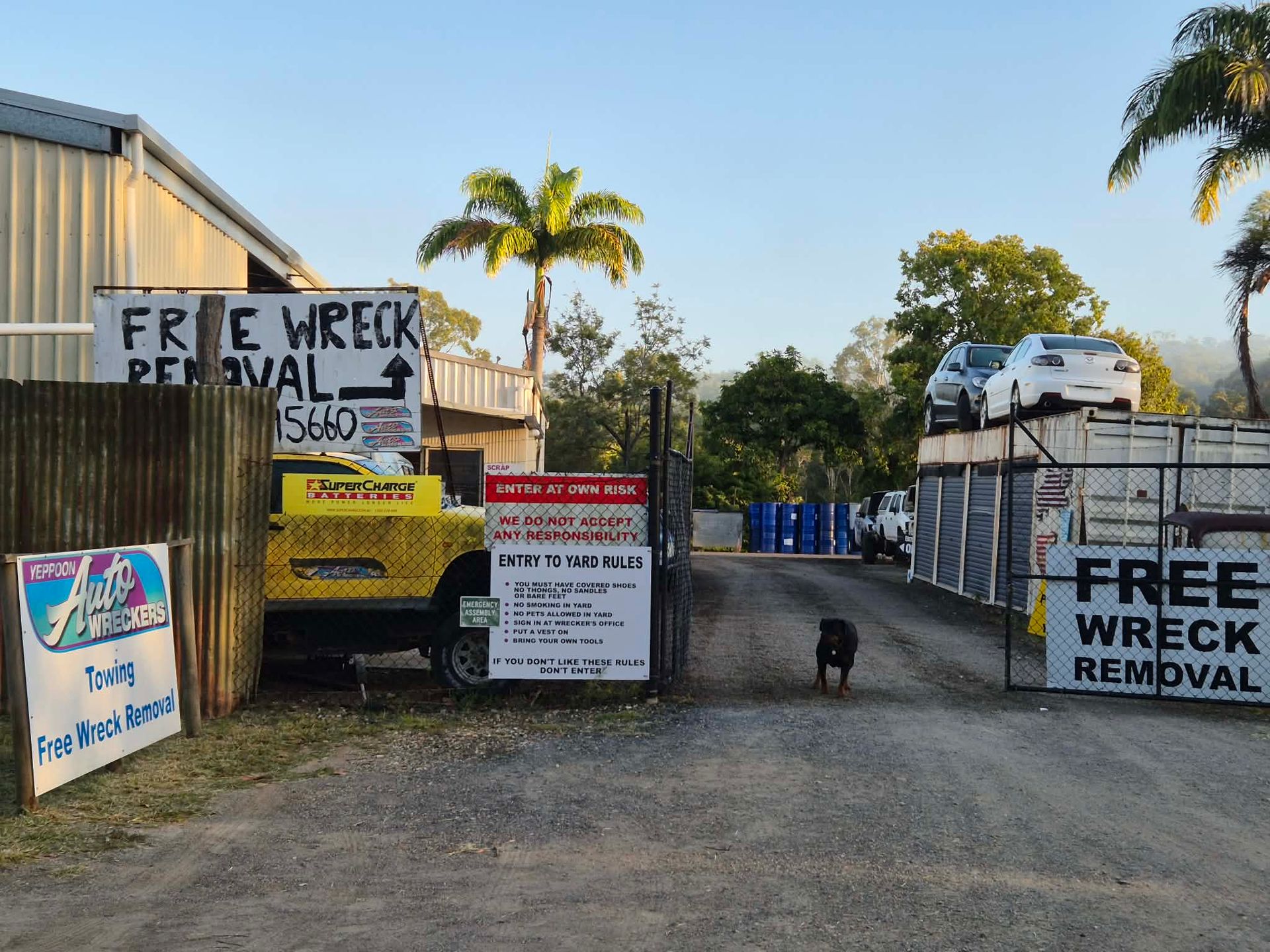 Wrecked Car Outside Workshop — Local Vehicle Scrapping And Repair Professionals in Bondoola, QLD