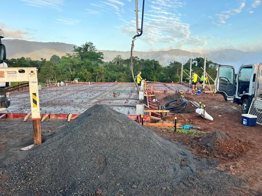 A Pile of Dirt is Sitting on Top of a Construction Site — Core Concrete in Port Douglas, QLD