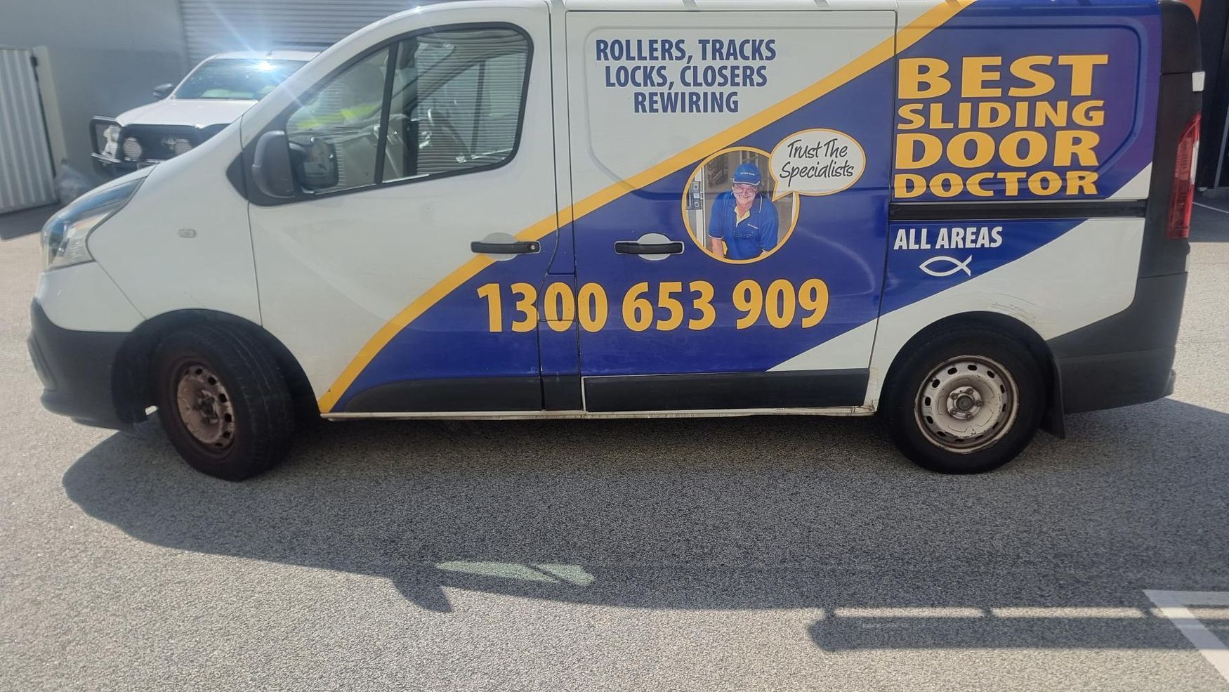 A living room with sliding glass doors leading to a patio