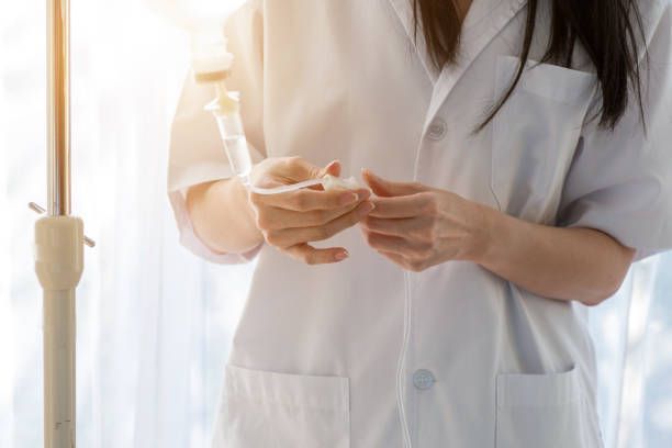 Doctor Holding a Syringe - Graham, TX - Revival IV