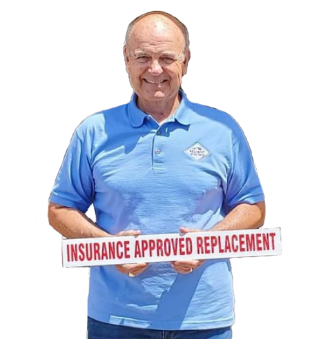 Image of reliant roof pro employee member holding an insurance approved replacement sign