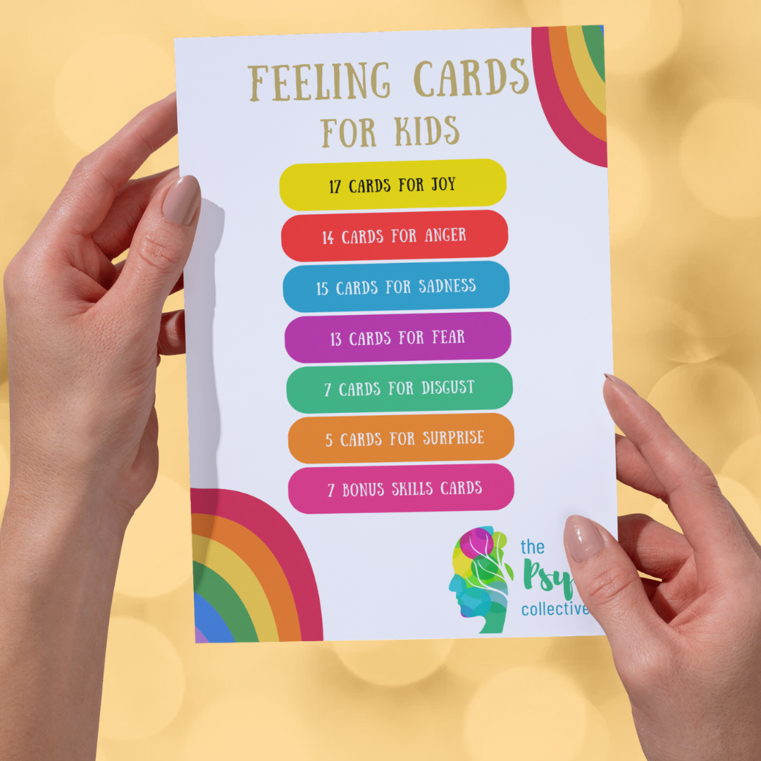 An image of hands holding a card of feeling cards for kids.
