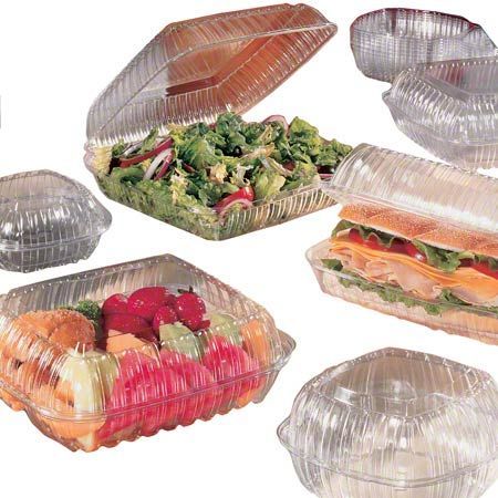 A variety of plastic containers with food in them
