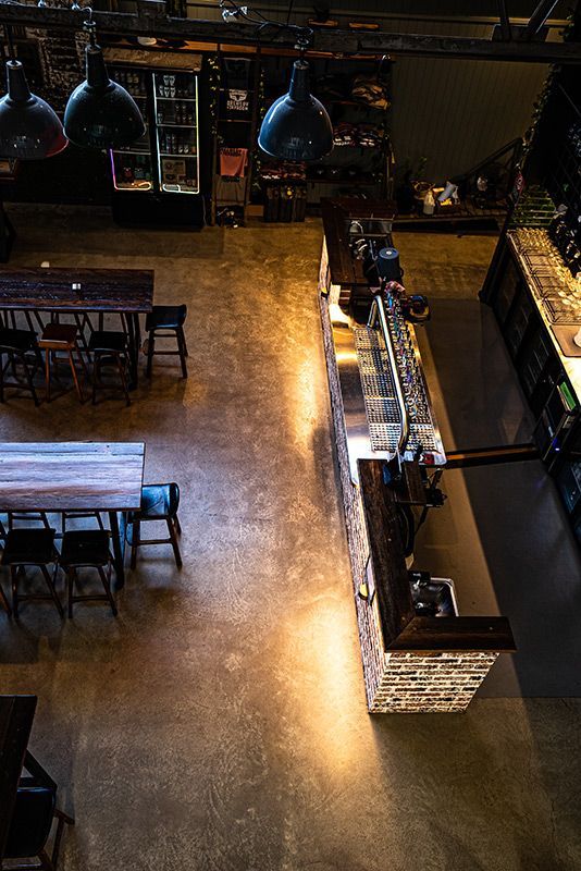 An Aerial View of A Restaurant with Tables and Chairs — Construction & Renovation Services in Dubbo, NSW