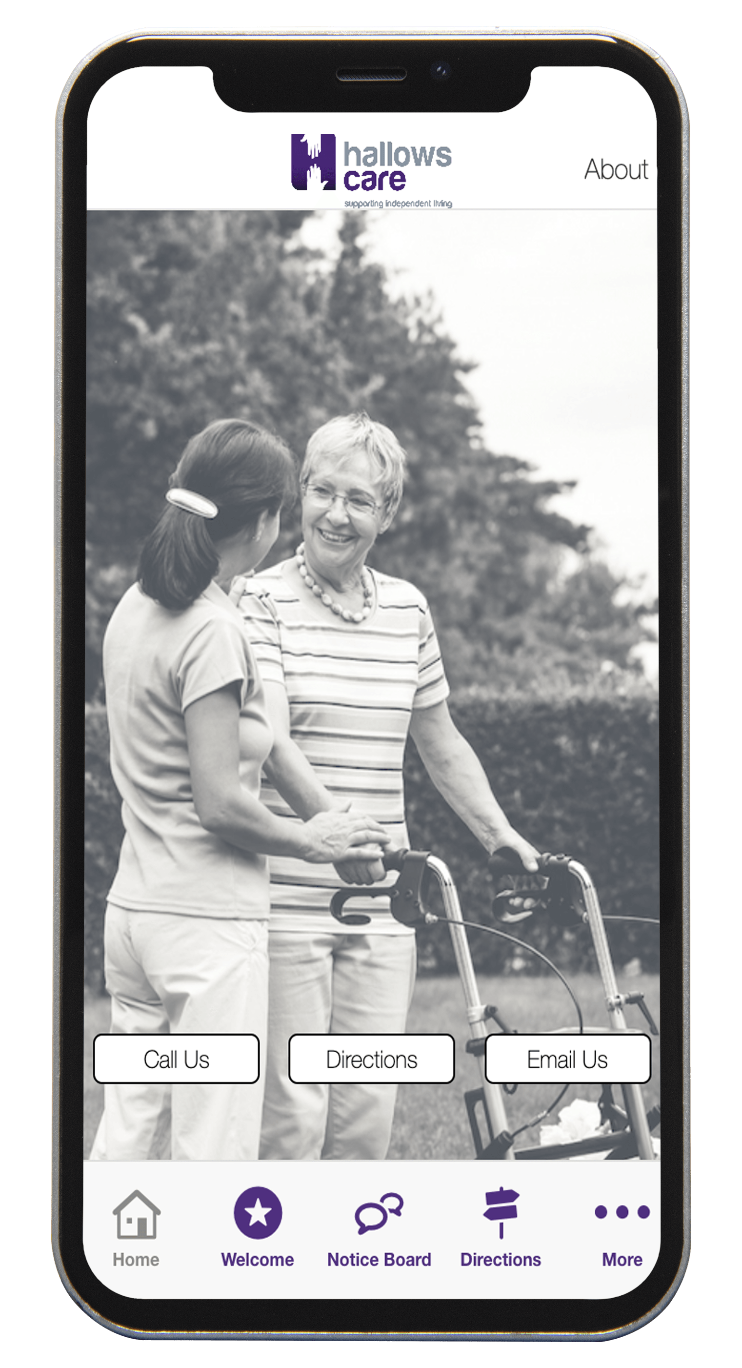 Hallows Care app on a smartphone, displaying a black and white photo of two women, one using a walker.
