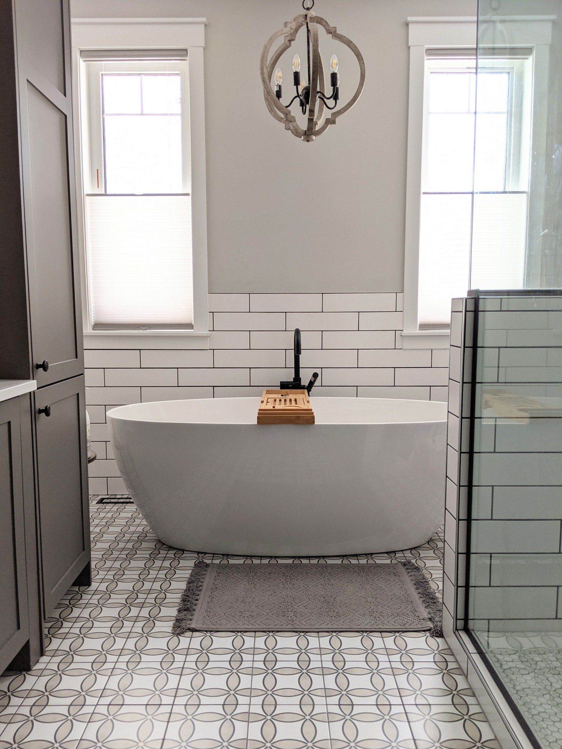 bathroom with white ceramic bathtub