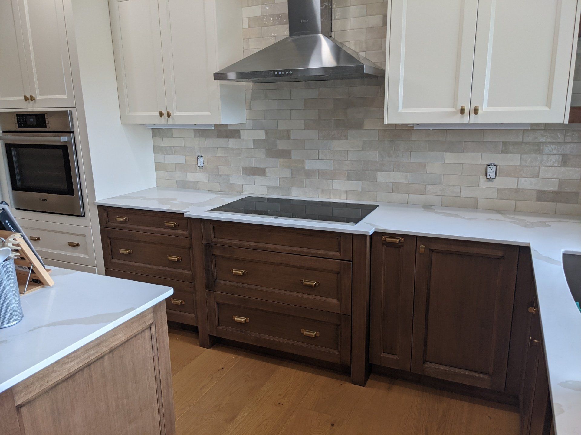 kitchen interior with chimney and wooden cabinets