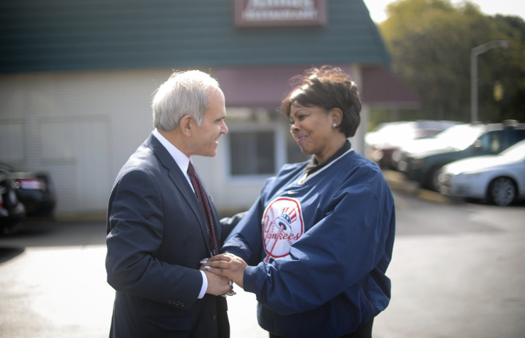 Jonathan Jacobson greeting a constituent
