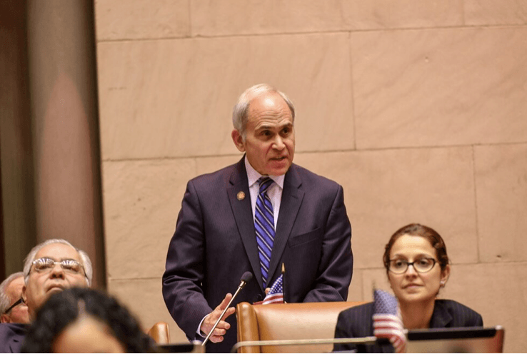 Jonathan Jacobson speaking in the Assembly chamber