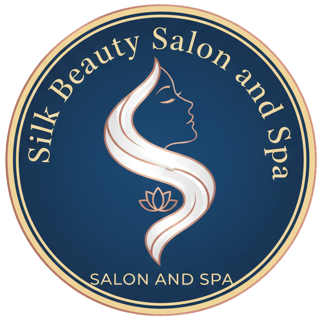 Silk Beauty Salon and Spa logo. Blue circle with text and a woman's profile intertwined with a white S shape, a small lotus flower.