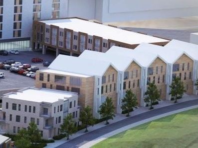 An aerial view of a building with a lot of windows