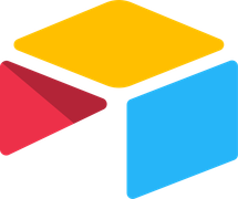 A yellow , red , and blue cube on a white background.