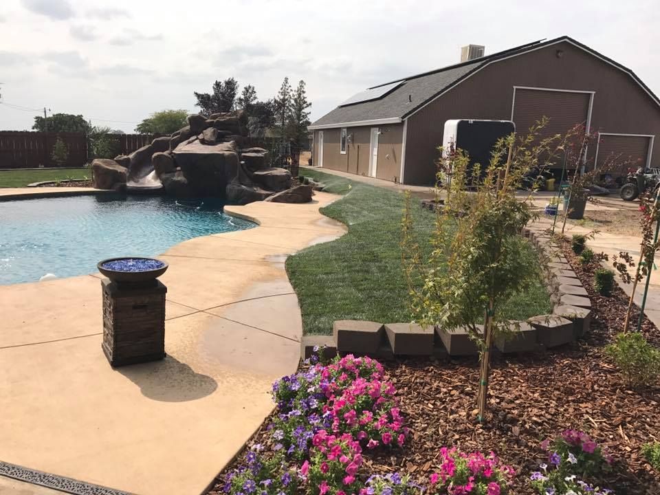 A Large House with A Swimming Pool in The Backyard - Oroville, CA - JR Landscaping 