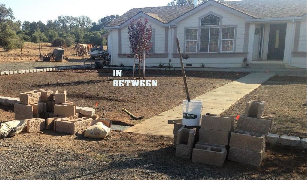 A Picture of A House with The Words in Between Written on It - Oroville, CA - JR Landscaping 