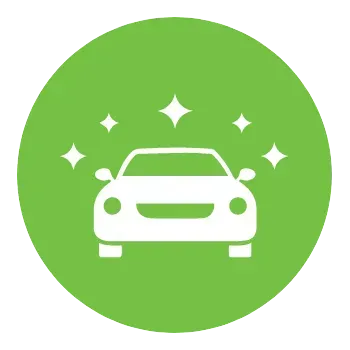 A white car is sitting in a green circle with stars around it.