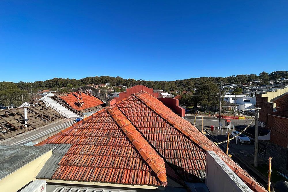 Vibrant Orange Roof Enhancing Lanewoods' Charm — Roofer in Hunter Valley, NSW