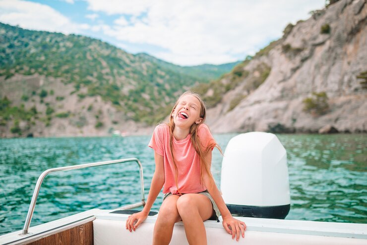 Girl Having Fun on a Sailing Yacht