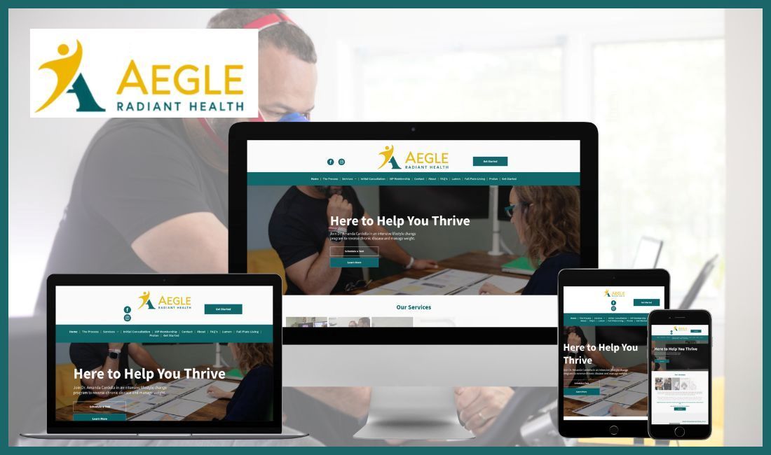 A computer , laptop , tablet , and cell phone displaying a website for a construction company.