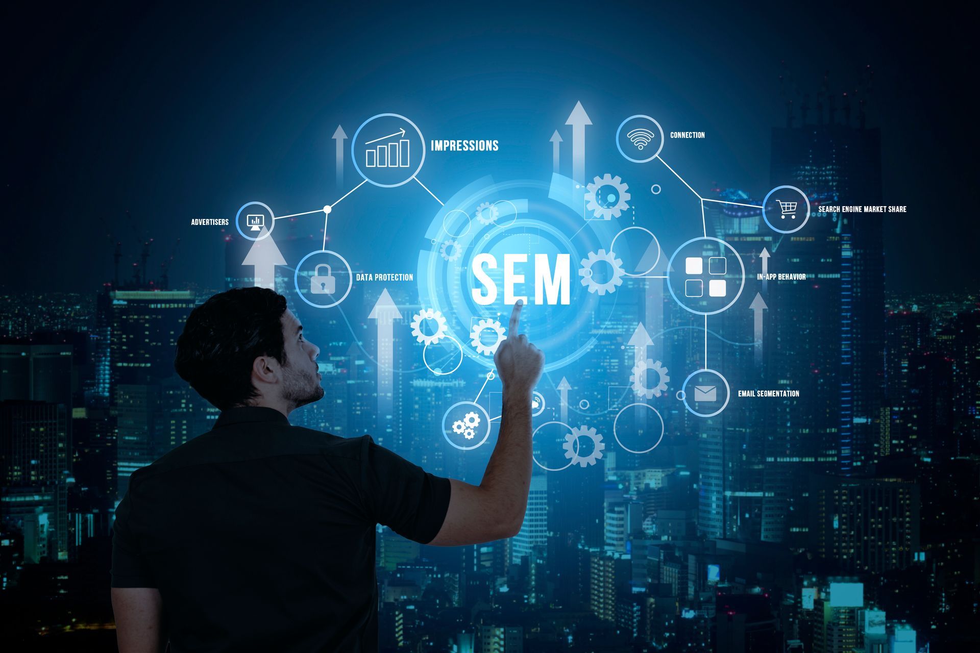a man is pointing at a screen with the word sem on it .