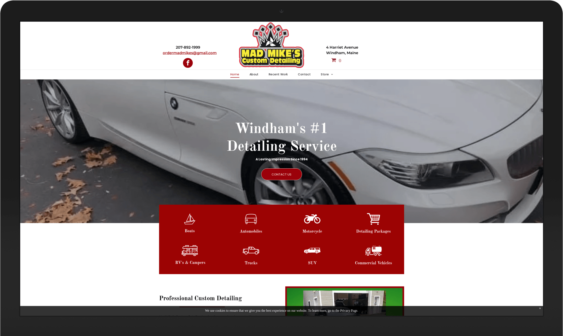 A laptop screen shows a white car on the website.