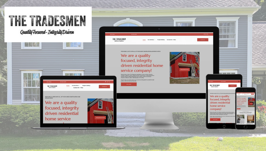 A computer , laptop , tablet , and cell phone displaying a website for a construction company.