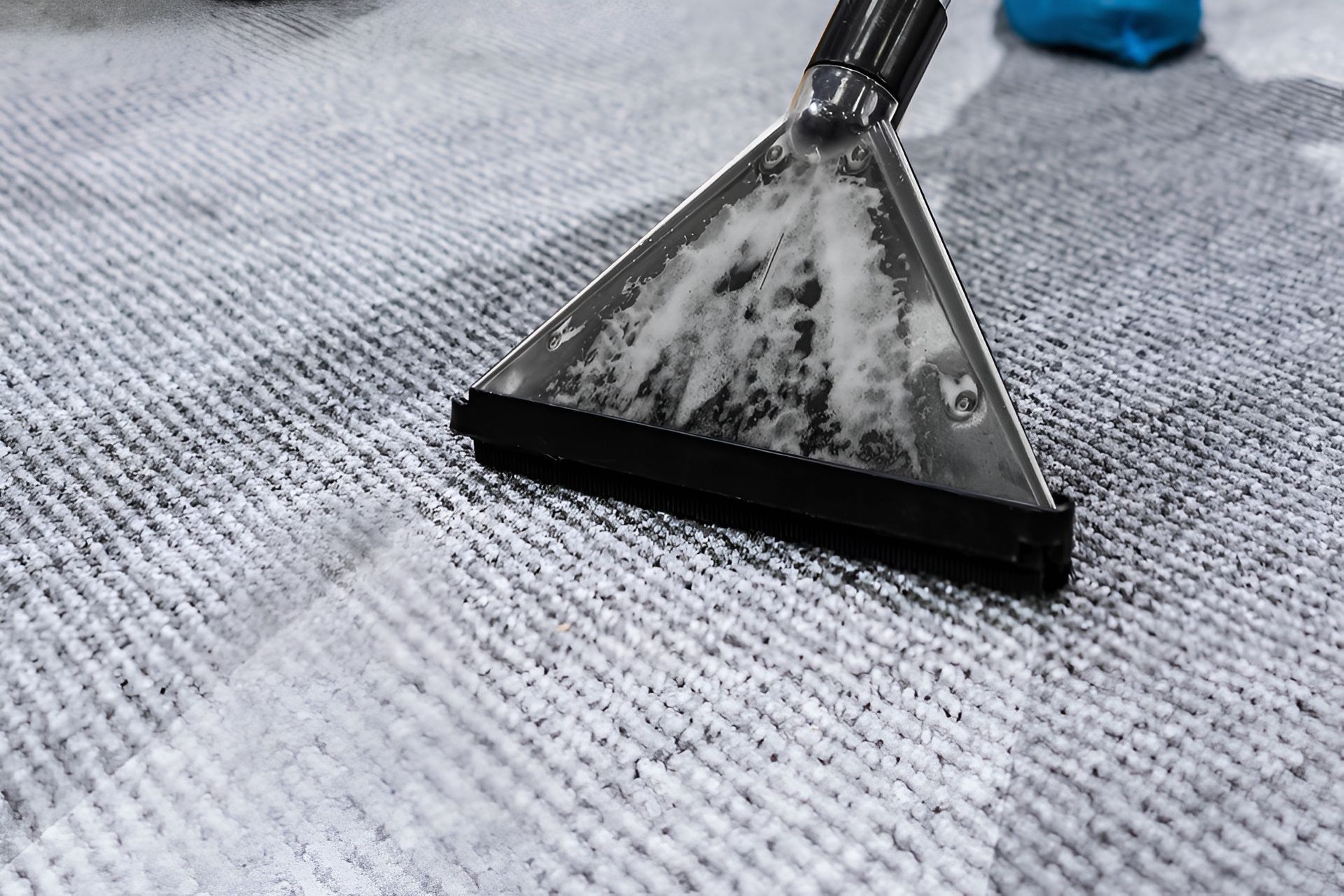 Carpet Being Cleaned With a Vacuum Attachment — Magic Mist Carpet Cleaning in Yeppoon, QLD