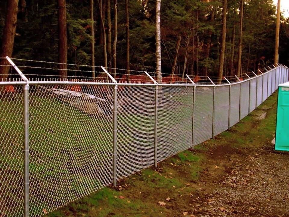 Chainlink with Barb Wire — Fence Repair in Hammond, Indiana