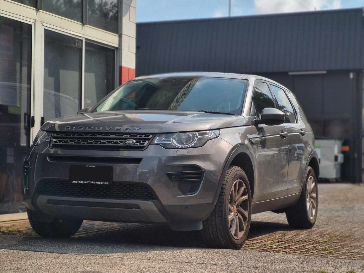A Silver Land Rover Discovery is Parked in Front of a Building — BJM Mechanical Mufflers & Tyres In Oxenford, QLD