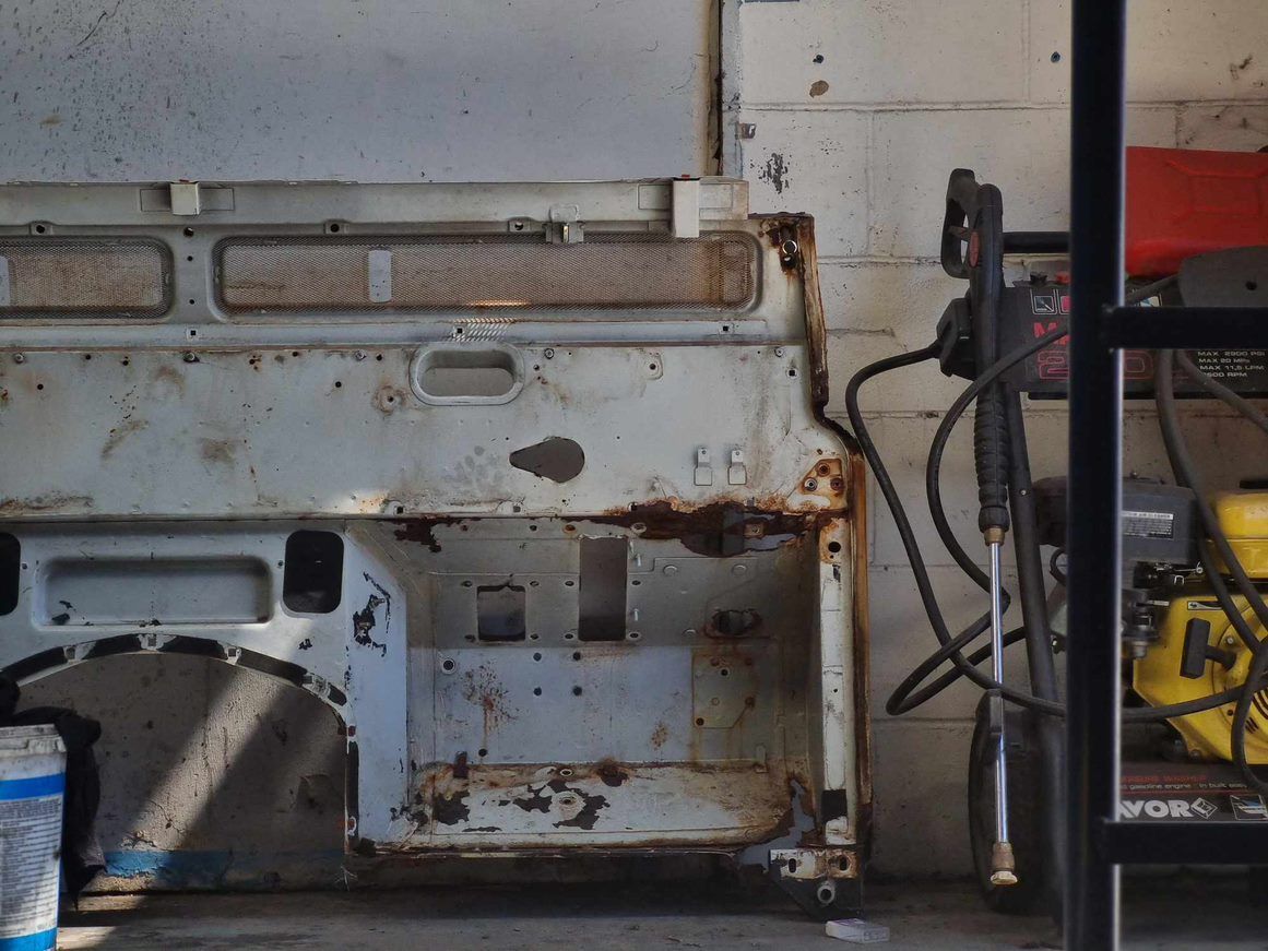 A Piece of Rusty Metal With the Number F9 on It — BJM Mechanical Mufflers & Tyres In Oxenford, QLD