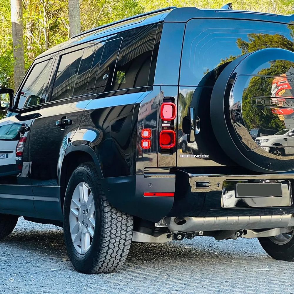 Black Land Rover Defender Parked Outdoors — BJM Mechanical Mufflers & Tyres On The Gold Coast, QLD