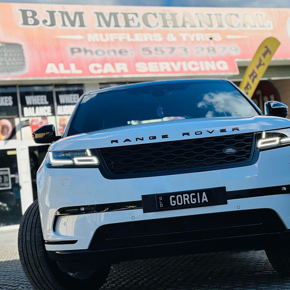White Range Rover SUV Parked In Front Of BJM Mechanical Shop — BJM Mechanical Mufflers & Tyres On The Gold Coast, QLD