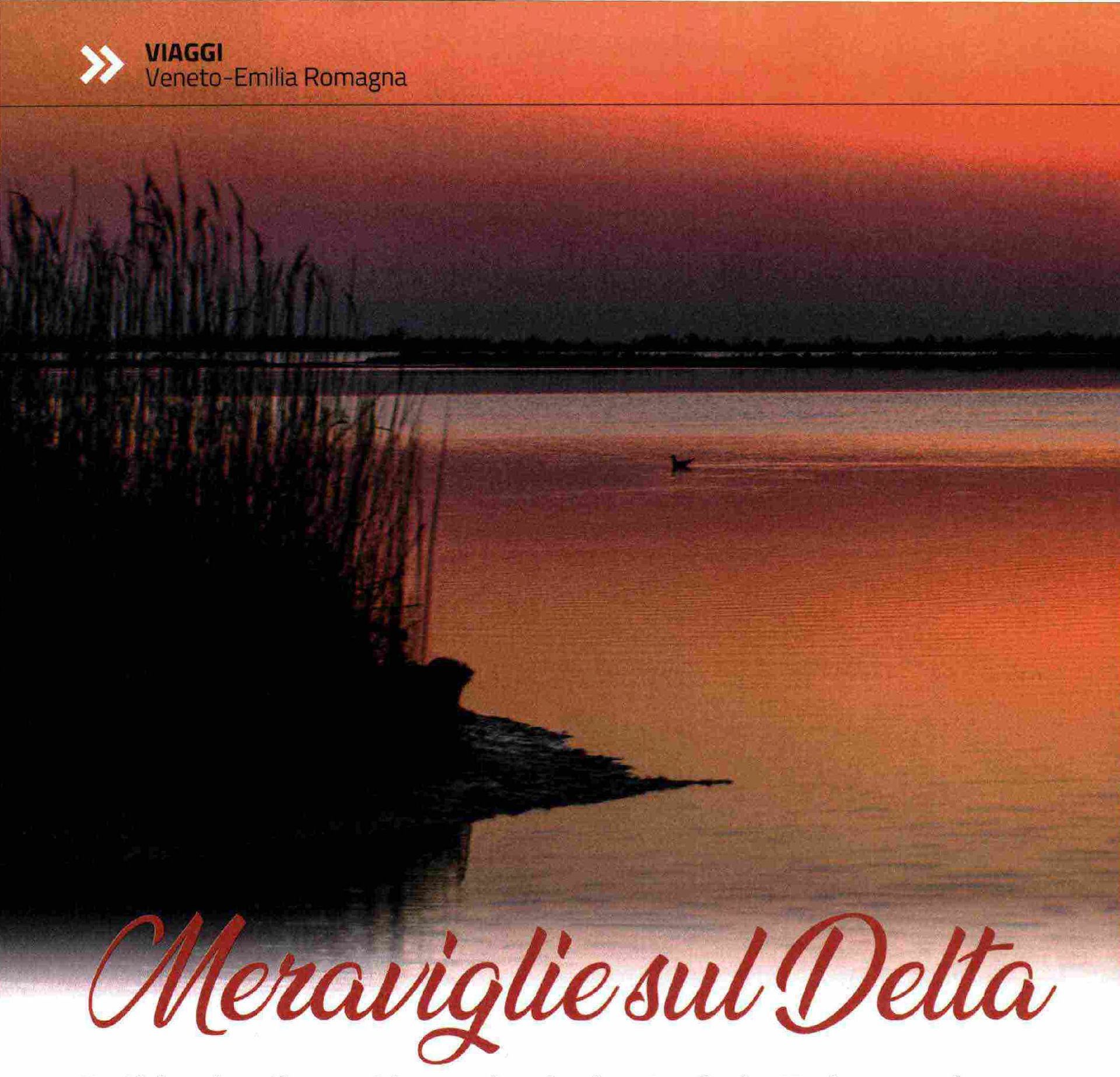 Tramonto su uno specchio d'acqua, canneti in silhouette. Testo: 