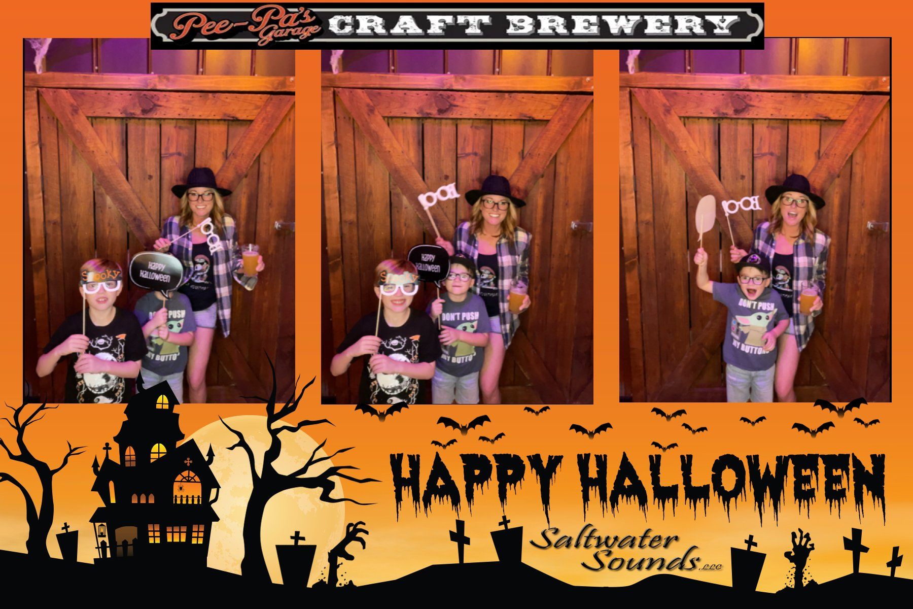 A photo booth with the words happy halloween on it